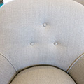 French Nursery chair. Details of buttons and linen.